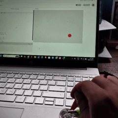Tapping the coin connected to the LEFT - on the Makey Makey forces the bouncing red circle to move left regardless of its current direction.